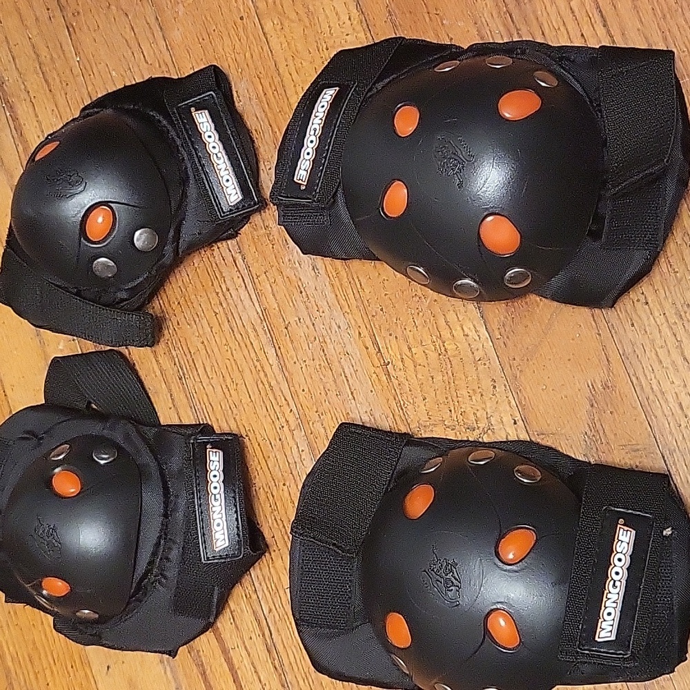 Knee pads and shoulder pads two different sets Mongoose and roller derby